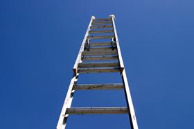 An Extended Ladder Pointing At The Sky